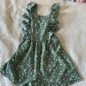 Green backless floral romper with tie & ruffle sleeves